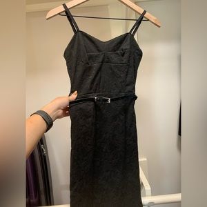 Elegant Belted structured mid length black dress with slit in back